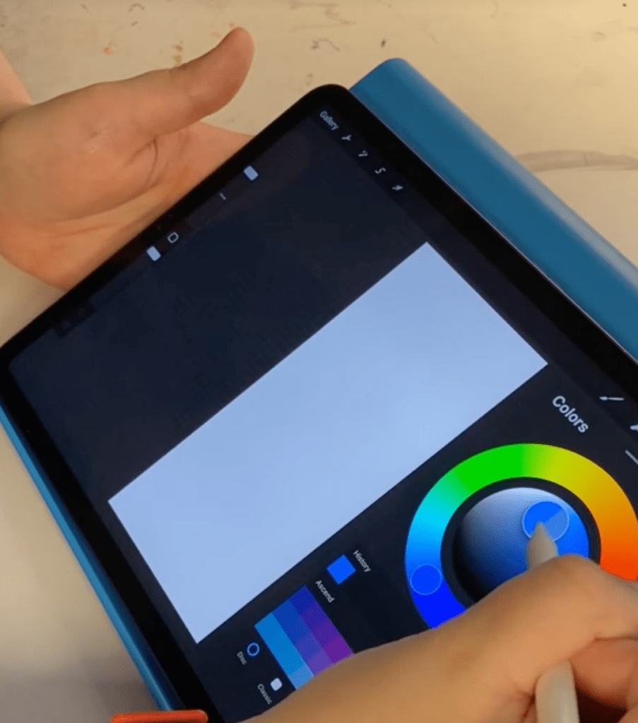 Opening up a new document in Procreate and selecting colors with the Pencil.